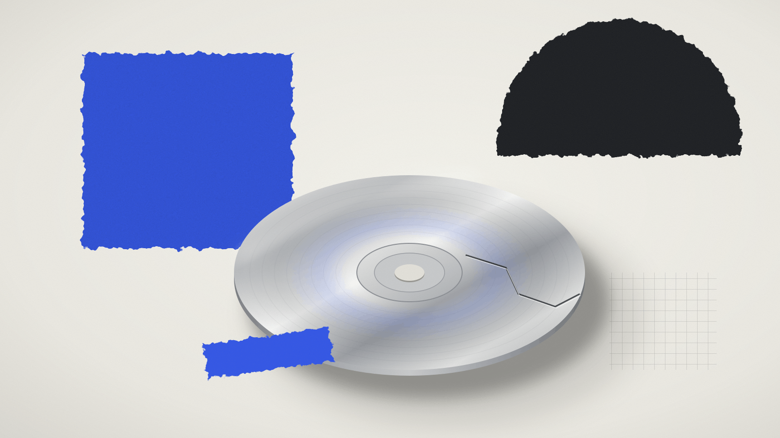Cracked silver software disc on warm paper beside torn cobalt and black paper shapes